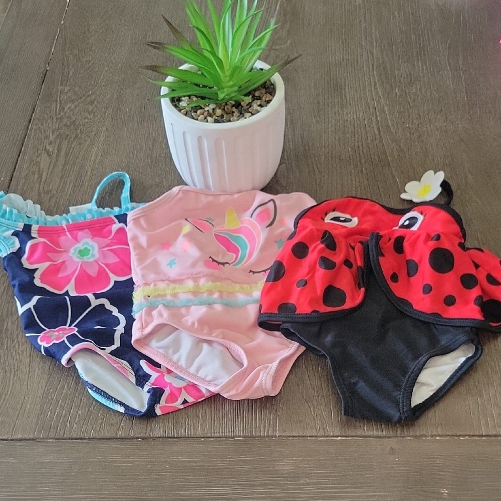 Vibrant Pink and Red One Piece Swimsuit with Playful Patterns